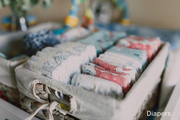 diaper station checklist essentials flat lay wipes diapers cream